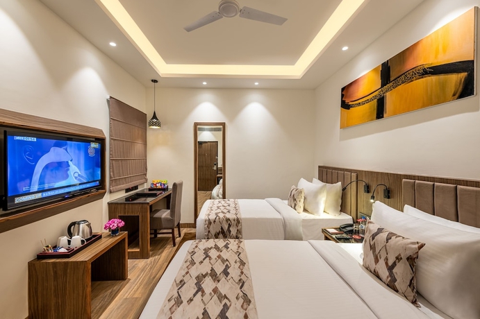Imagen de la habitación del Hotel Lords Eco Inn Dehradun. Foto 10