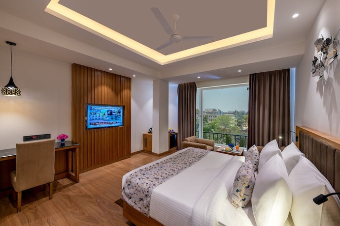 Imagen de la habitación del Hotel Lords Eco Inn Dehradun. Foto 11