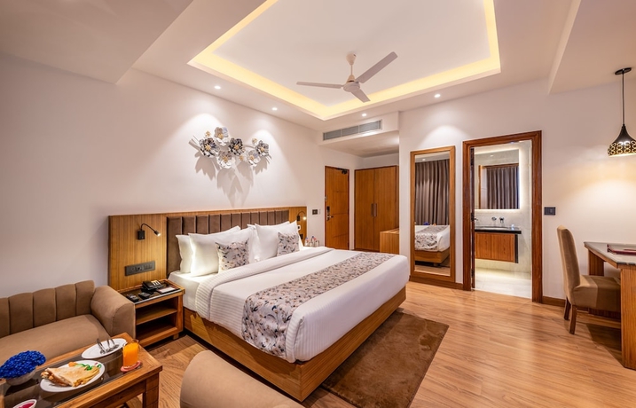 Imagen de la habitación del Hotel Lords Eco Inn Dehradun. Foto 12