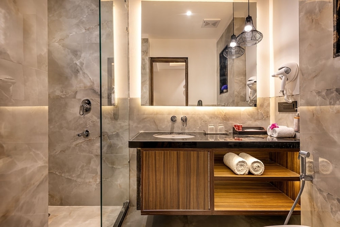 Imagen de la habitación del Hotel Lords Eco Inn Dehradun. Foto 16
