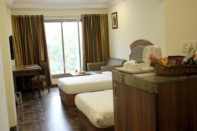 Imagen de la habitación del Hotel Lords Eco Inn, Gandhidham. Foto 2