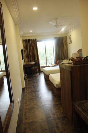Imagen de la habitación del Hotel Lords Eco Inn, Gandhidham. Foto 9