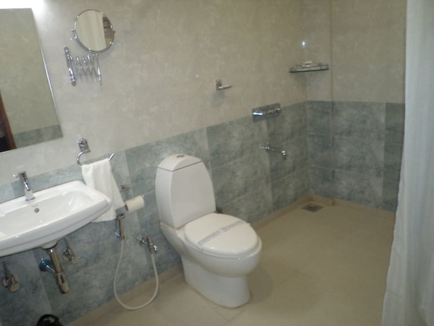 Imagen de la habitación del Hotel Lords Eco Inn, Gandhidham. Foto 12