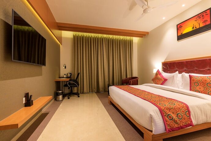 Imagen de la habitación del Hotel Lords Eco Inn Jamnagar. Foto 16