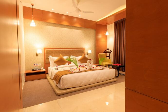 Imagen de la habitación del Hotel Lords Eco Inn Jamnagar. Foto 17