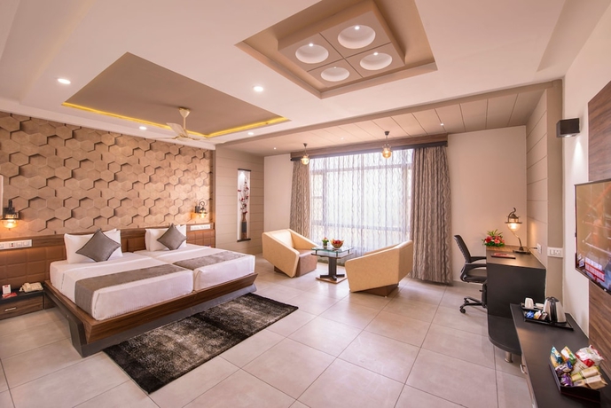 Imagen de la habitación del Hotel Lords Eco Inn Morbi. Foto 2