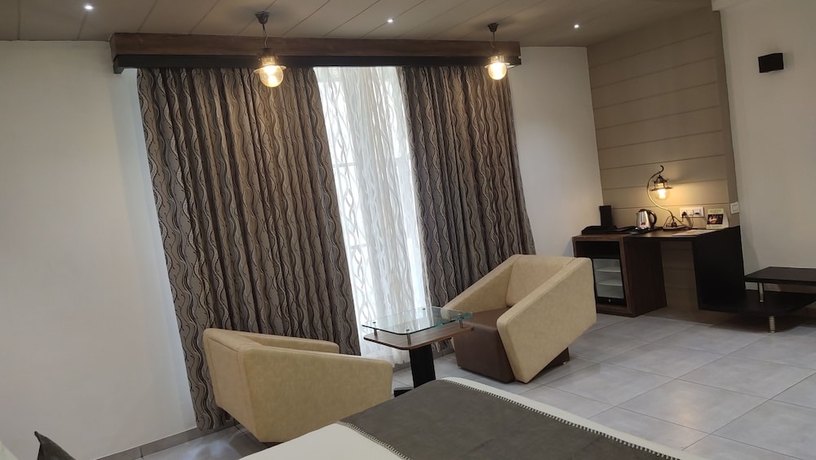 Imagen de la habitación del Hotel Lords Eco Inn Morbi. Foto 3