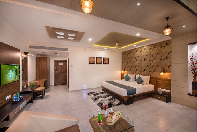 Imagen de la habitación del Hotel Lords Eco Inn Morbi. Foto 8