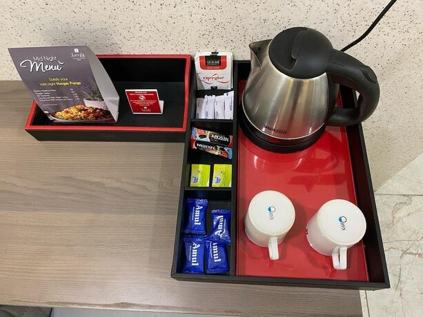 Imagen de la habitación del Hotel Lords Eco Inn Navsari. Foto 19