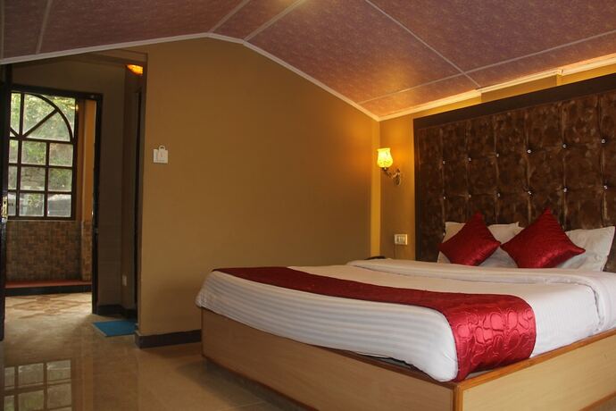 Imagen de la habitación del Hotel Lords Garden Glory. Foto 16