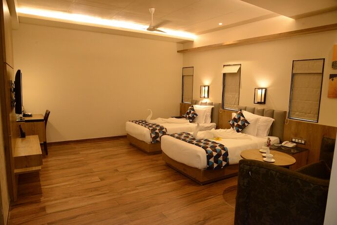 Imagen de la habitación del Hotel Lords Inn Jamnagar. Foto 12