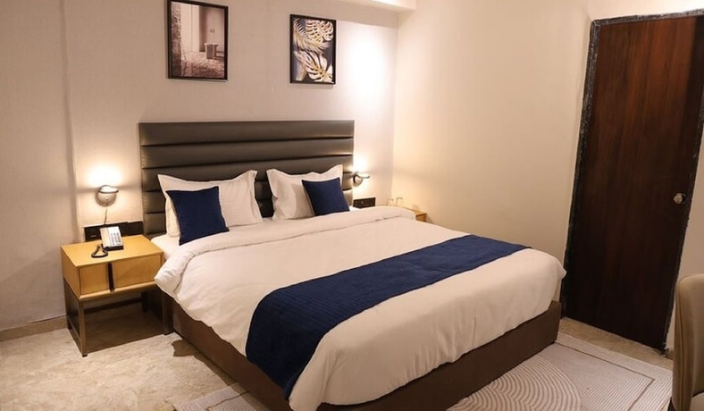 Imagen de la habitación del Hotel Lords Studio Inn, Jamnagar. Foto 8