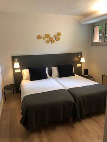 Imagen de la habitación del Hotel L'orée Du Bois. Foto 2