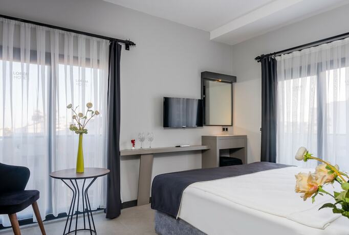 Imagen de la habitación del Hotel Lorem. Foto 15