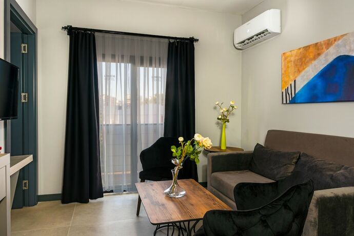 Imagen de la habitación del Hotel Lorem. Foto 16
