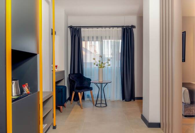 Imagen de la habitación del Hotel Lorem. Foto 17