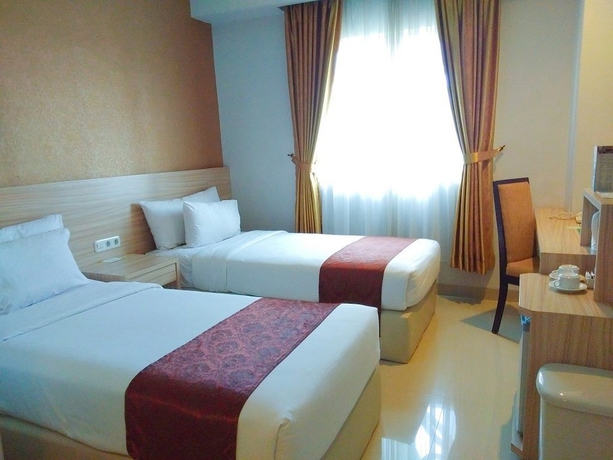Imagen de la habitación del Hotel Lorin Syariah Solo. Foto 3