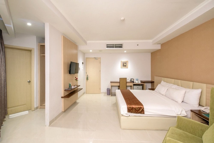 Imagen de la habitación del Hotel Lorin Syariah Solo. Foto 8