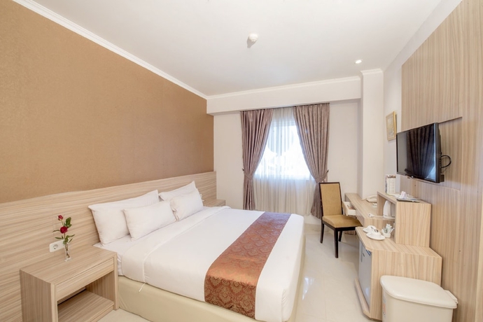 Imagen de la habitación del Hotel Lorin Syariah Solo. Foto 10
