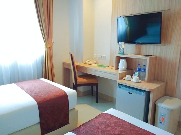 Imagen de la habitación del Hotel Lorin Syariah Solo. Foto 11