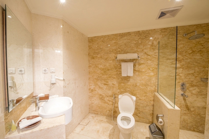Imagen de la habitación del Hotel Lorin Syariah Solo. Foto 14