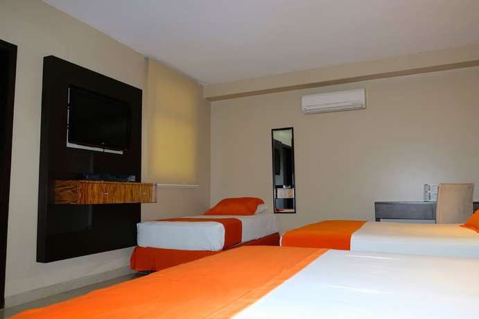 Imagen de la habitación del Hotel Los Almendros, Manta. Foto 10