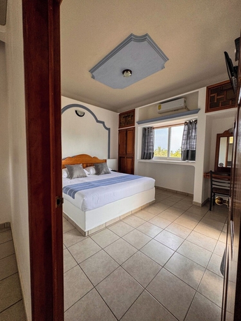 Imagen de la habitación del Hotel Los Angeles, San Pedro Pochutla. Foto 8