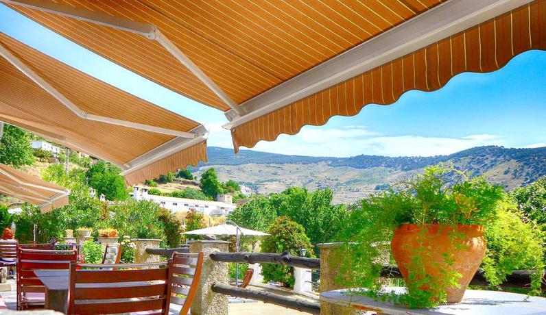 Imagen de los exteriores del Hotel Los Bérchules. Foto 11