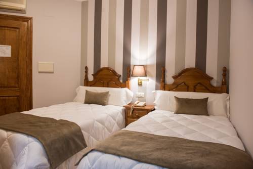 Imagen de la habitación del Hotel Los Cazadores. Foto 6