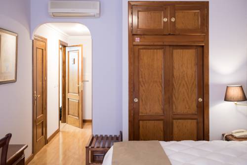 Imagen de la habitación del Hotel Los Cazadores. Foto 10