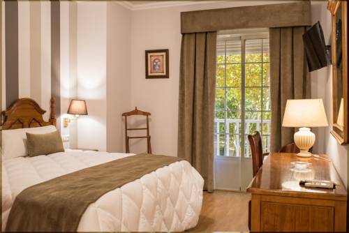 Imagen de la habitación del Hotel Los Cazadores. Foto 12