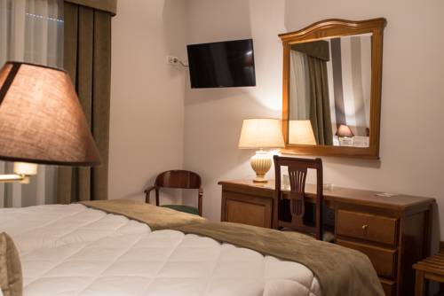 Imagen de la habitación del Hotel Los Cazadores. Foto 13