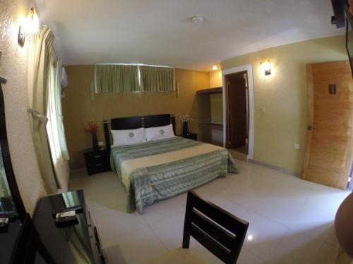 Imagen de la habitación del Hotel Los Cedros De Uayam&oacute;n. Foto 6