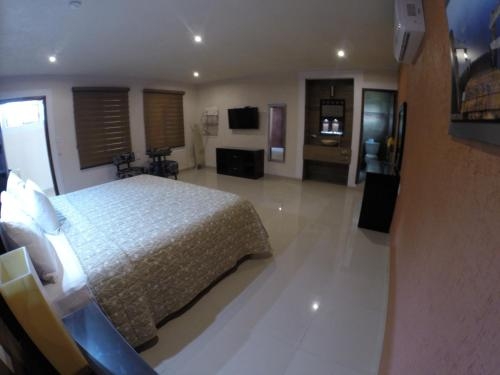 Imagen de la habitación del Hotel Los Cedros De Uayam&oacute;n. Foto 8