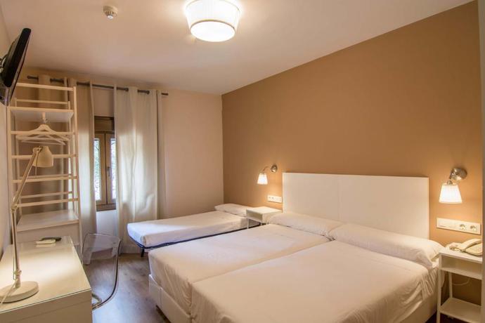 Imagen de la habitación del Hotel Los Cigarrales. Foto 7