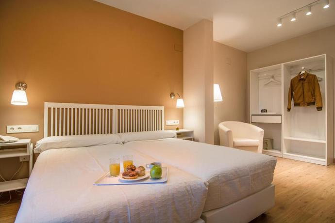 Imagen de la habitación del Hotel Los Cigarrales. Foto 10