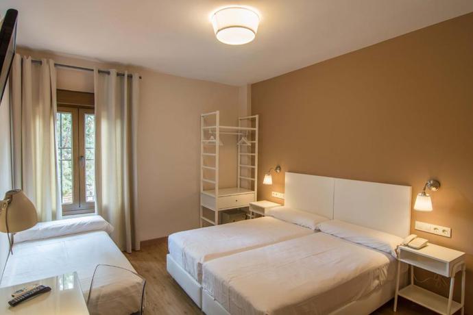 Imagen de la habitación del Hotel Los Cigarrales. Foto 11