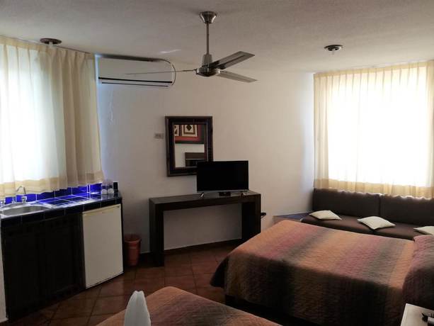 Imagen de la habitación del Hotel Los Girasoles Cancun. Foto 8