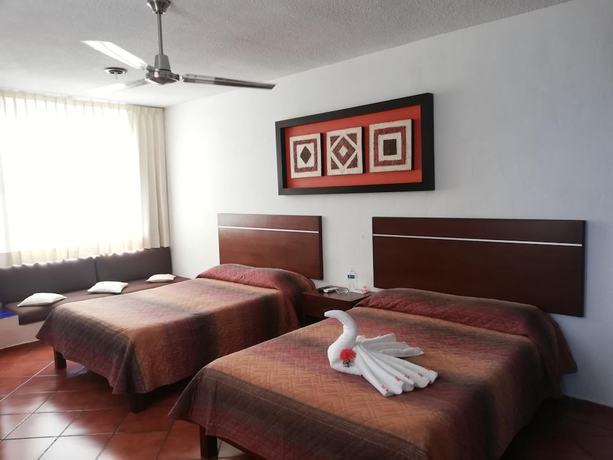 Imagen de la habitación del Hotel Los Girasoles Cancun. Foto 9