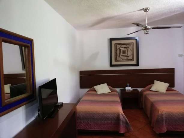 Imagen de la habitación del Hotel Los Girasoles Cancun. Foto 10