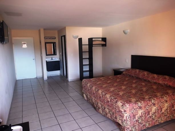 Imagen de la habitación del Hotel Los Jitos and Suites. Foto 3