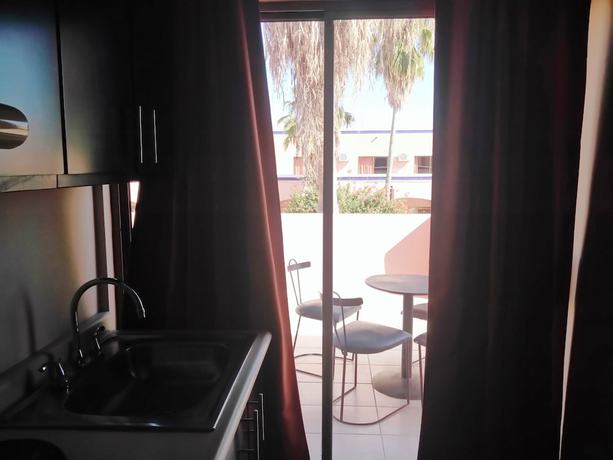 Imagen de la habitación del Hotel Los Jitos and Suites. Foto 5
