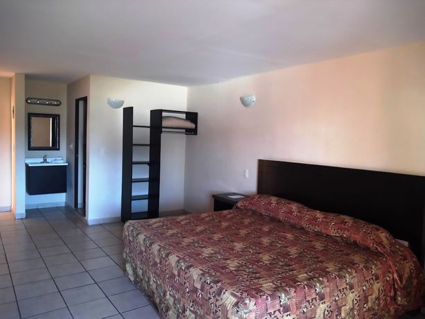 Imagen de la habitación del Hotel Los Jitos and Suites. Foto 10