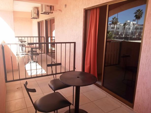 Imagen de la habitación del Hotel Los Jitos and Suites. Foto 14