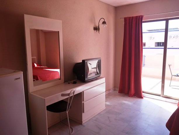 Imagen de la habitación del Hotel Los Jitos and Suites. Foto 16