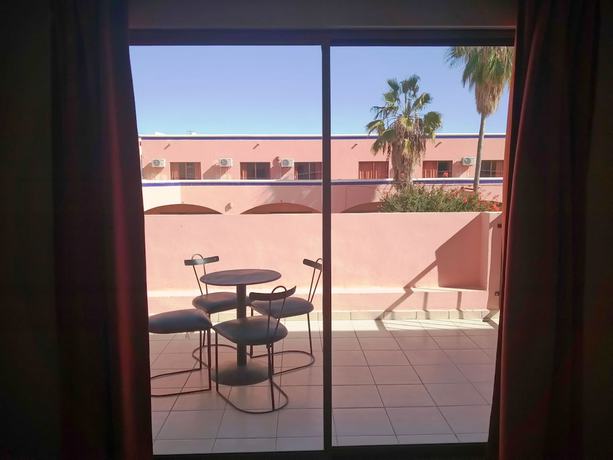 Imagen de la habitación del Hotel Los Jitos and Suites. Foto 18