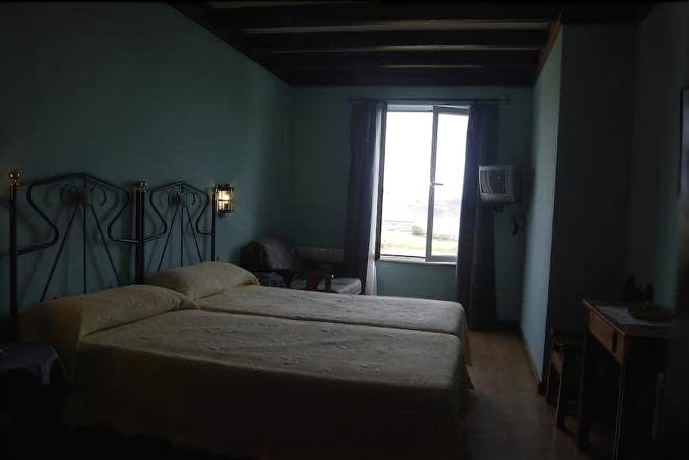 Imagen de la habitación del Hotel Los Laureles. Foto 15