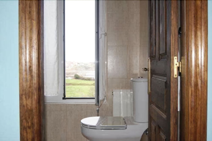 Imagen de la habitación del Hotel Los Laureles. Foto 17