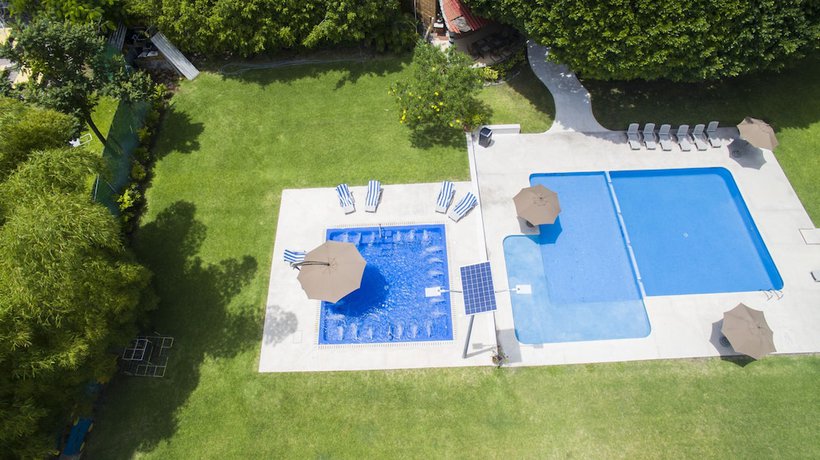 Imagen de la piscina del Hotel Los Laureles and Centro de Convenciones. Foto 19