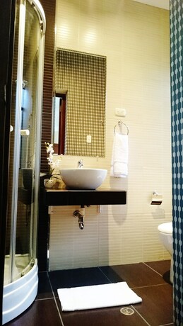 Imagen de la habitación del Hotel Los Leones Boutique. Foto 19